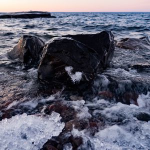 Preview wallpaper stones, sea, horizon, ice, coast
