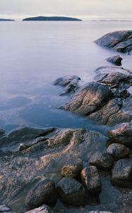 Preview wallpaper stones, sea, horizon, island