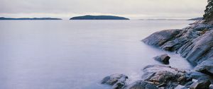 Preview wallpaper stones, sea, horizon, island