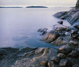 Preview wallpaper stones, sea, horizon, island