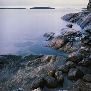 Preview wallpaper stones, sea, horizon, island