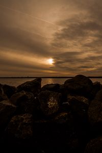 Preview wallpaper stones, sea, landscape, evening