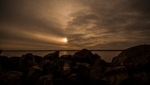 Preview wallpaper stones, sea, landscape, evening