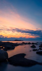 Preview wallpaper stones, sea, sky, evening, coast, mediterranean