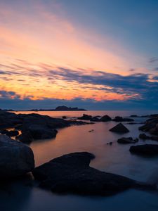 Preview wallpaper stones, sea, sky, evening, coast, mediterranean