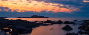 Preview wallpaper stones, sea, sky, evening, coast, mediterranean