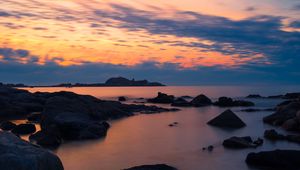 Preview wallpaper stones, sea, sky, evening, coast, mediterranean