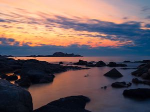 Preview wallpaper stones, sea, sky, evening, coast, mediterranean