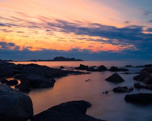 Preview wallpaper stones, sea, sky, evening, coast, mediterranean