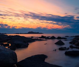 Preview wallpaper stones, sea, sky, evening, coast, mediterranean