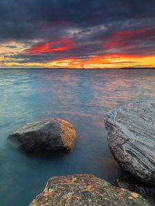 Preview wallpaper stones, sea, sunset, horizon