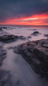 Preview wallpaper stones, sea, sunset, horizon, coast