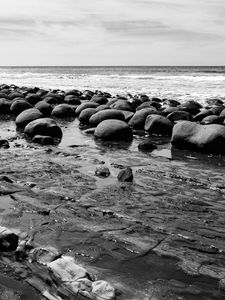 Preview wallpaper stones, sea, water, beach, horizon, bw