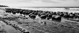 Preview wallpaper stones, sea, water, beach, horizon, bw