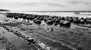 Preview wallpaper stones, sea, water, beach, horizon, bw