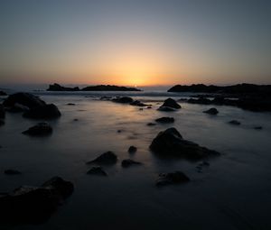 Preview wallpaper stones, sea, water, sunset, dark