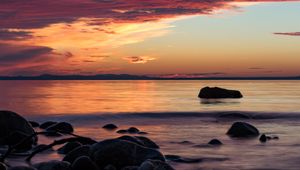 Preview wallpaper stones, sea, wave, clouds, sunset, nature
