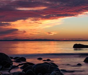 Preview wallpaper stones, sea, wave, clouds, sunset, nature