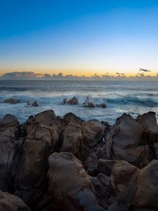 Preview wallpaper stones, sea, waves, horizon, nature, sunset
