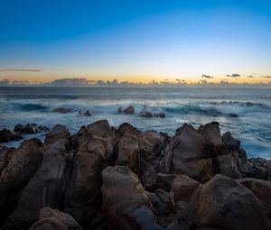 Preview wallpaper stones, sea, waves, horizon, nature, sunset