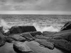 Preview wallpaper stones, shore, sea, waves, splashes, black and white