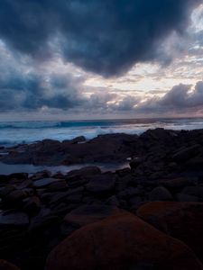 Preview wallpaper stones, shore, sea, dark