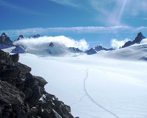 Preview wallpaper stones, snow, mountains, sky, sun, avalanche