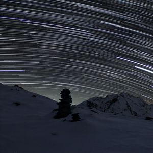 Preview wallpaper stones, snow, night, sky, stars, long exposure