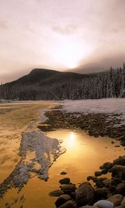 Preview wallpaper stones, snow, river, current, canada, mountain, trees