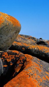 Preview wallpaper stones, stains, coast, beacon, sea