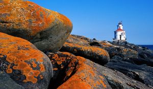Preview wallpaper stones, stains, coast, beacon, sea