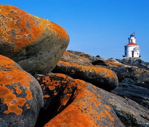 Preview wallpaper stones, stains, coast, beacon, sea