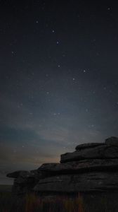 Preview wallpaper stones, starry sky, grass, nature, dark