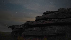Preview wallpaper stones, starry sky, grass, nature, dark