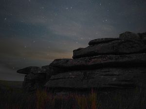 Preview wallpaper stones, starry sky, grass, nature, dark