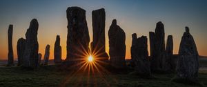 Preview wallpaper stones, stonehenge, sun, sunset