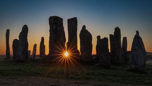 Preview wallpaper stones, stonehenge, sun, sunset