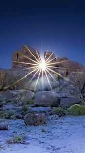 Preview wallpaper stones, sun, rays, nature, landscape