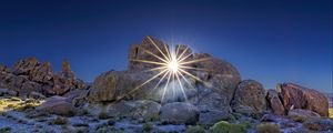 Preview wallpaper stones, sun, rays, nature, landscape