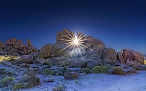 Preview wallpaper stones, sun, rays, nature, landscape