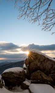 Preview wallpaper stones, sun, snow, winter, branches, nature