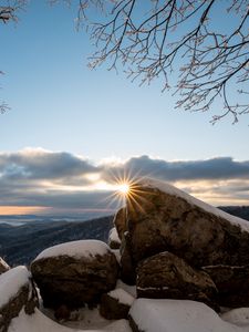 Preview wallpaper stones, sun, snow, winter, branches, nature