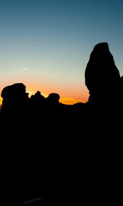 Preview wallpaper stones, sunset, silhouettes, utah, sky