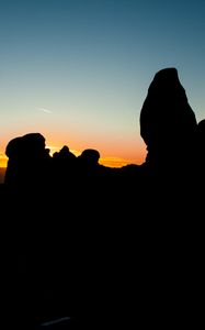 Preview wallpaper stones, sunset, silhouettes, utah, sky