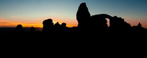 Preview wallpaper stones, sunset, silhouettes, utah, sky