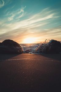 Preview wallpaper stones, surf, beach, sand, sunset