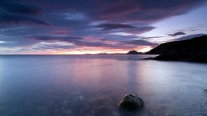 Preview wallpaper stones, twilight, decline, surface of the water, horizon, lilac