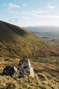 Preview wallpaper stones, valley, trail, hill, slope, grass