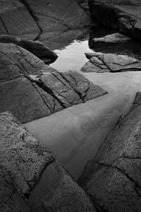 Preview wallpaper stones, water, black and white, relief