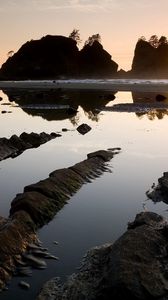 Preview wallpaper stones, water, clouds, sky, sun, horizon